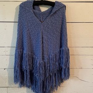 Cozy and stylish poncho. Never worn.